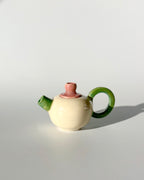 Tetera rosa y verde